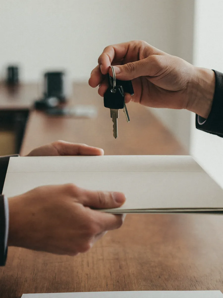 Keys and file, back across the counter